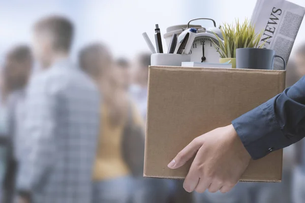 Fired Office Worker Carrying Personal Belongings Box Crowd People Background — ストック写真