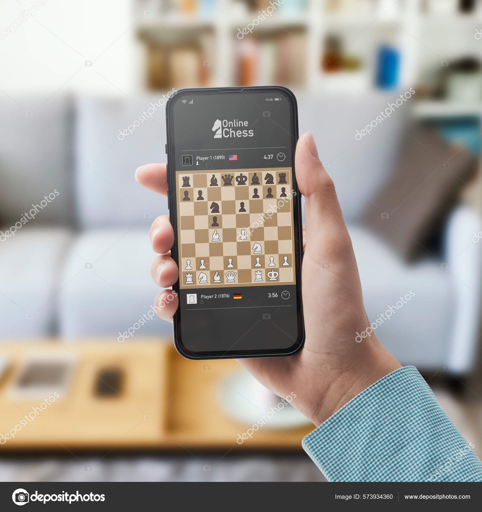 User Playing Chess Online Smartphone Home Strategy Video Games Concept Stock Photo by ©stokkete 573934360