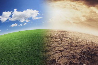 Green meadow field with sun and clouds. Concept of climate change, weather and environment. Landscape of a cracked meadow in a field with rocks, concept of climate change, world warming or climate change. 