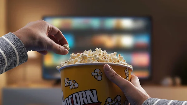 Woman Eating Popcorn Watching Videos Demand Home — стоковое фото