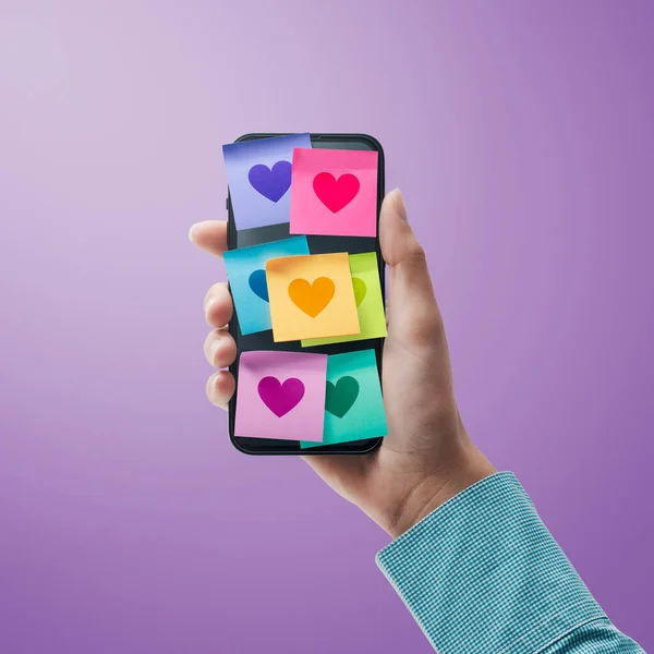 Woman Holding Smartphone Lots Sticky Notes Hearts Display Relationships Communication — Stockfoto