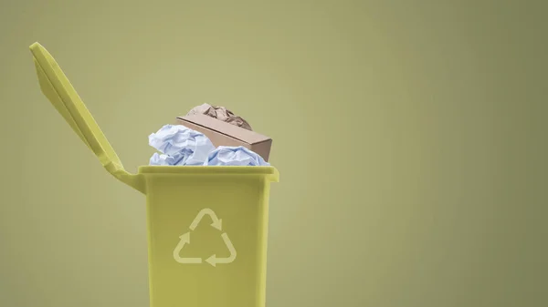 Garbage can full of paper waste, recycling and separate waste collection concept