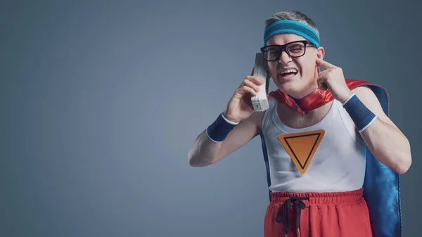 Funny Superhero Making Phone Call Using Old Obsolete Cordless Telephone — Stock Photo, Image