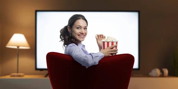 Young Woman Smiling Camera Watching Movies Her Smart Home Entertainment — Stockfoto