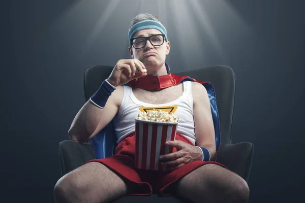 Funny Superhero Watching Boring Movie Eating Popcorn Sad Disappointed — Stock Photo, Image