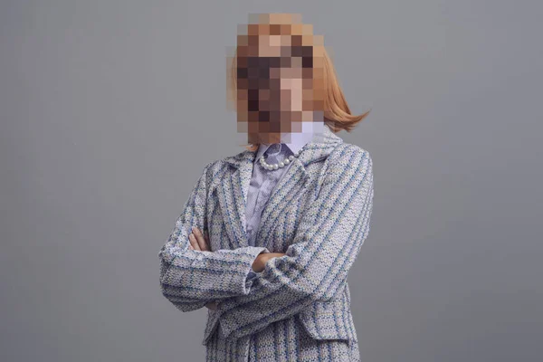 Portrait of woman with blurred face, identity protection concept