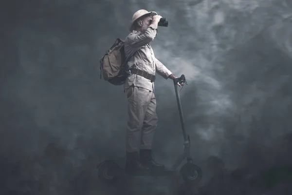 Vintage Style Explorer Riding Electric Scooter Surrounded Toxic Gas Pollution — Stock Photo, Image