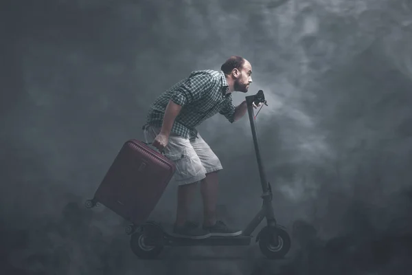 Tourist Carrying Trolley Bag Riding Electric Scooter Surrounded Toxic Gas — Stock Photo, Image