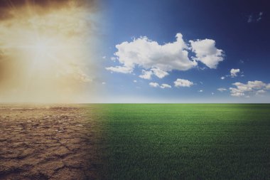 Green meadow field with sun and clouds. Concept of climate change, weather and environment. Landscape of a cracked meadow in a field with rocks, concept of climate change, world warming or climate change. 
