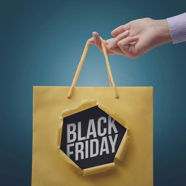 Vásárló Kezében Egy Bevásárló Táska Black Friday Promóciós Eladó — Stock Fotó