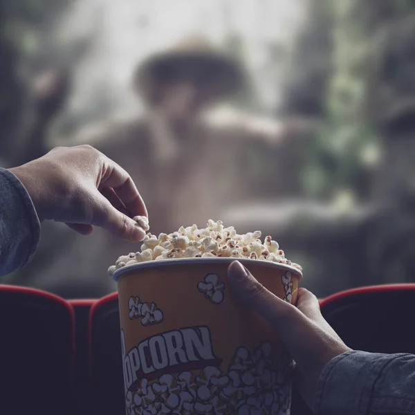 Woman Watching Adventure Movie Cinema Eating Popcorn Pov Shot — стоковое фото