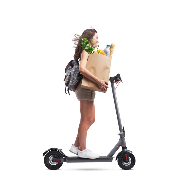 Young Woman Holding Paper Bag Groceries Riding Electric Scooter White — Stock Photo, Image