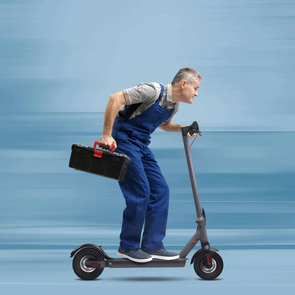 Professional Fast Repairman Riding Electric Scooter Express Repair Service Concept — Stock Photo, Image