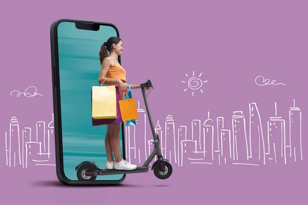 Mujer Feliz Sosteniendo Bolsas Compras Montando Scooter Ella Está Saliendo — Foto de Stock