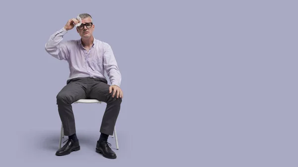 Emotional Stressed Man Sitting Chair Sweating His Shirt Wet Drying — Stock Photo, Image