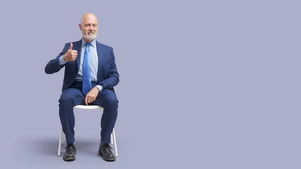 Happy Senior Businessman Sitting Chair Giving Thumbs Recommendation Approval Concept — Stock fotografie