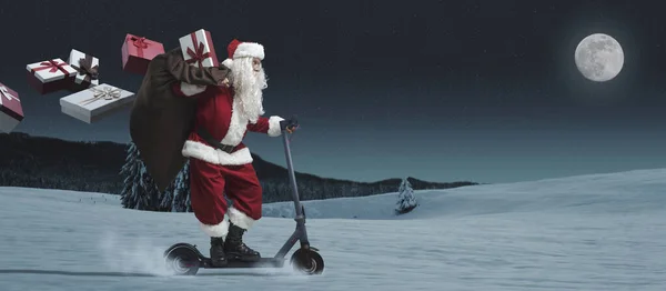 Contemporary Santa Claus Riding Eco Friendly Electric Scooter Delivering Christmas — Stock Photo, Image