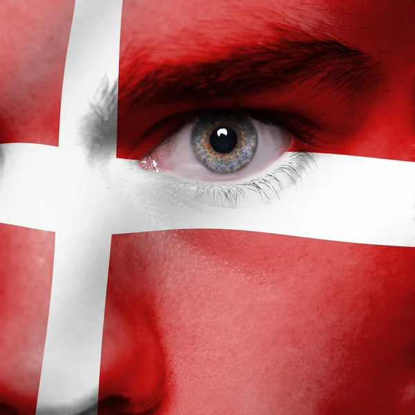 Danish flag painted on face — Stock Photo, Image