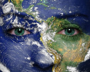 Earth painted on face. Elements of this image furnished by NASA clipart