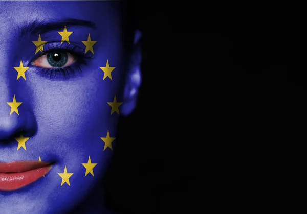 European Union flag painted on woman face — Stock Photo, Image