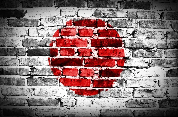 Bandera de Japón pintada en pared de ladrillo viejo —  Fotos de Stock