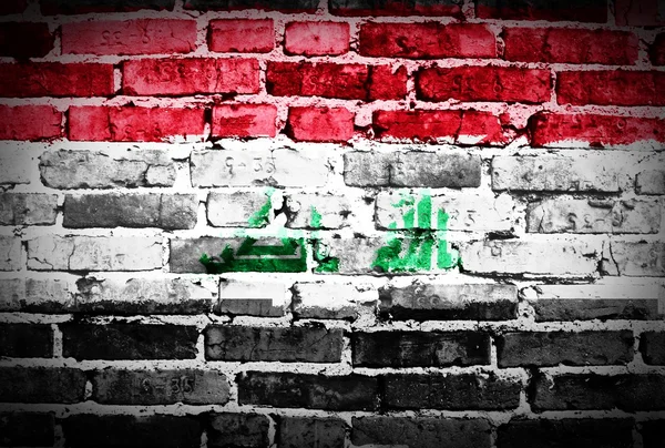 Iraq flag on old brick wall — Stock Photo, Image