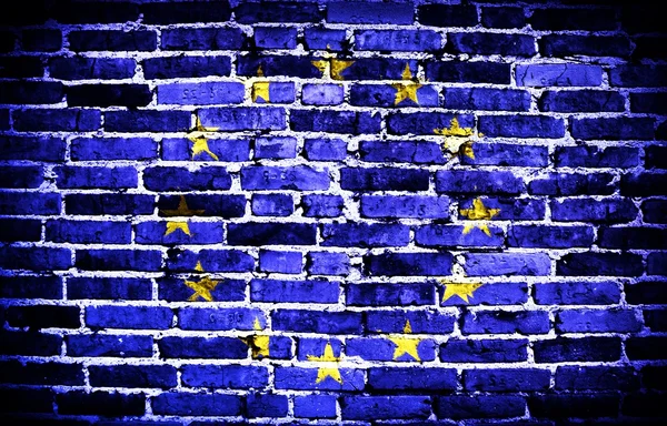 Unie vlajka Evropa na starou cihlovou zeď pozadí nebo textury — Stock fotografie