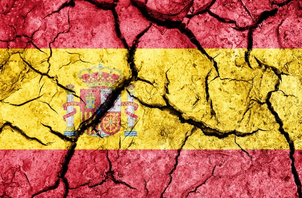 Spain flag on cracked earth background — Stock Photo, Image