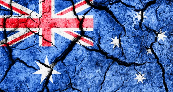 Bandera de Australia sobre fondo de tierra agrietado — Foto de Stock