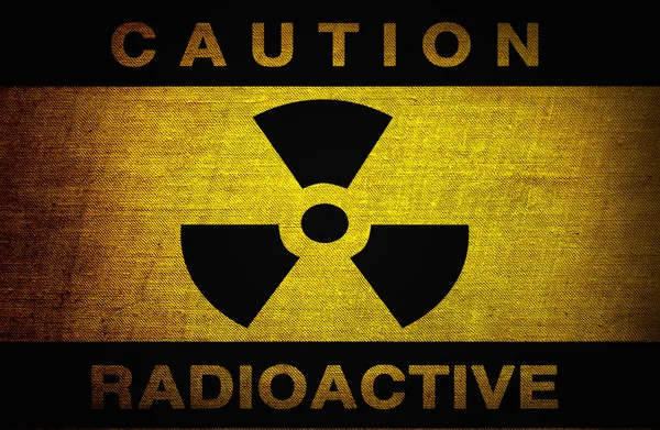 Radioactieve symbool op oude grunge achtergrond — Stockfoto