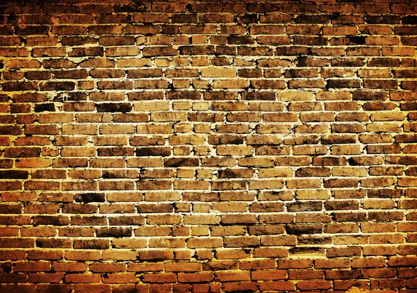 Weathered stained old brick wall background — Stock Photo, Image