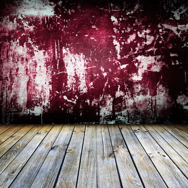 Empty old grungy room with red wall — Stock Photo, Image