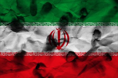 kağıt üzerinde kurşun delikleri ile İran bayrağı