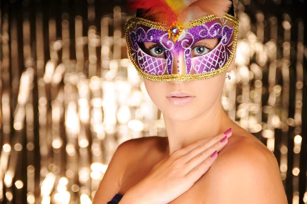 Beautiful young woman in carnival mask — Stock Photo, Image