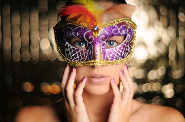 Beautiful young woman in carnival mask Royalty Free Stock Images