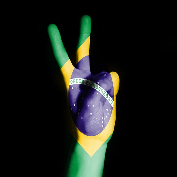 ブラジルの国旗とピースサイン — ストック写真