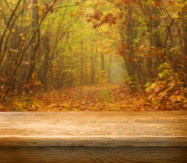 Autumn theme with empty table — Stock Photo, Image