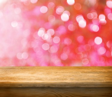 boş bir tablo ile kırmızı bokeh arka plan