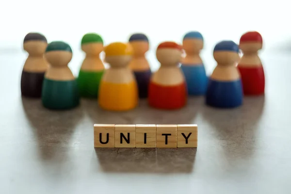 Ahşap Bloklar Arka Planda Bir Grup Insanla Ilgili Unity Kelimesi — Stok fotoğraf