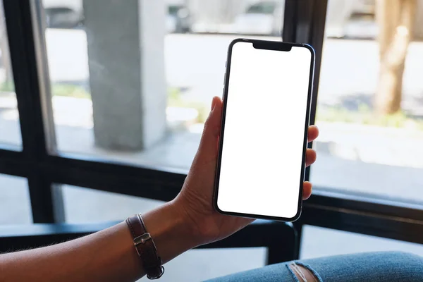 Mockup Image Woman Holding Showing Mobile Phone Blank White Desktop — стоковое фото