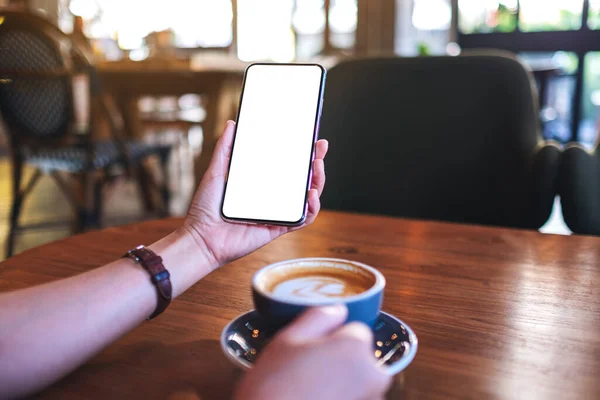 Mockup Image Woman Holding Mobile Phone Blank White Desktop Screen — стоковое фото