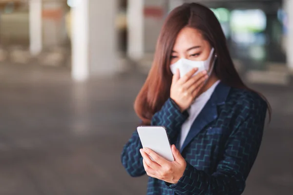 Closeup Image Sick Woman Wearing Protective Face Mask Using Mobile — Photo