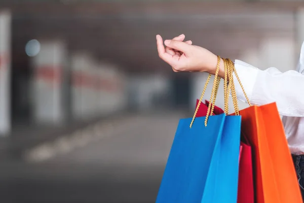 Closeup Image Woman Holding Shopping Bags Mall Parking Lot — Stockfoto
