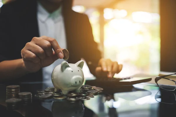 Businesswoman Calculating Putting Coin Piggy Bank Saving Money Financial Concept — Fotografia de Stock