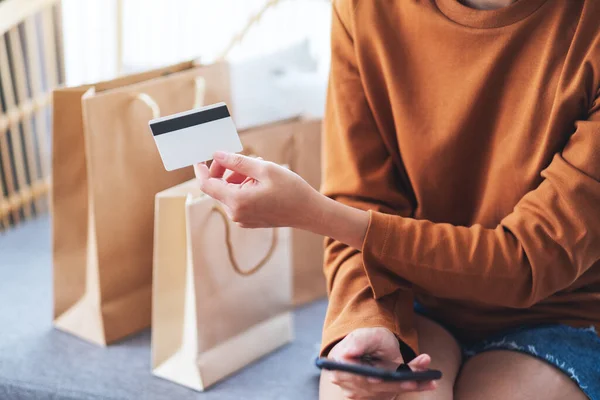 Closeup Image Woman Holding Credit Card Shopping Bags Home Online — Stockfoto