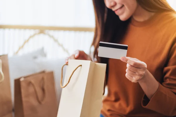 Closeup Image Beautiful Young Woman Holding Credit Card While Opening — Stockfoto