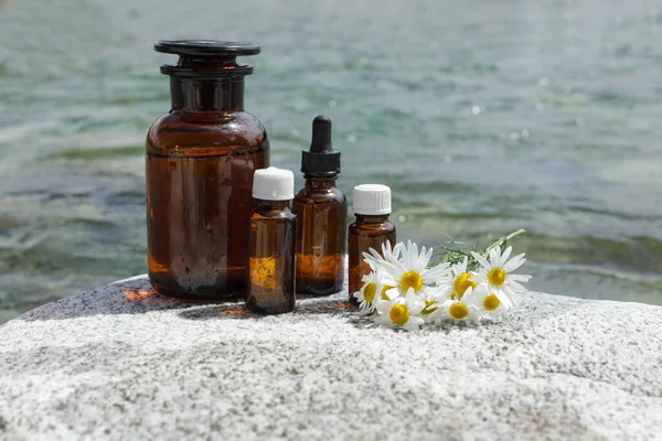 Set Medical Bottles Background Water Bottles Stone Chamomile Flowers Natural — Stock Photo, Image