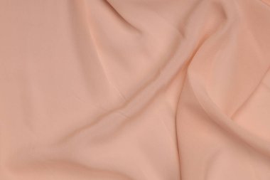 Pürüzsüz ipek ya da saten dokular düğün arka planı olarak kullanılabilir. Lüks arkaplan tasarımı