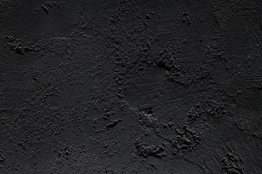 Siyah beton duvar, yaşla yıpranmış. Arkaplan.