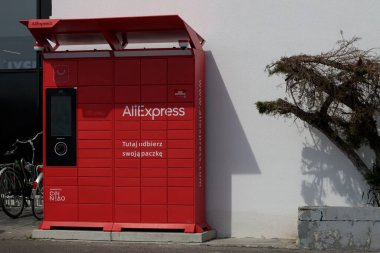 Poznan, Poland. 19 May 2022: AliExpress red locker, called packageshop, automatic parcel inbox.